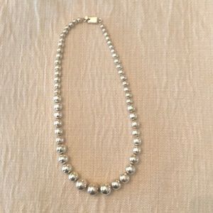 Sliver beaded necklace approximately 20 inches long